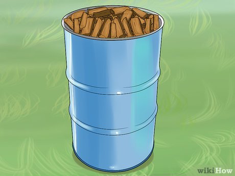 Step 4 Заполните бочку кусками древесины.